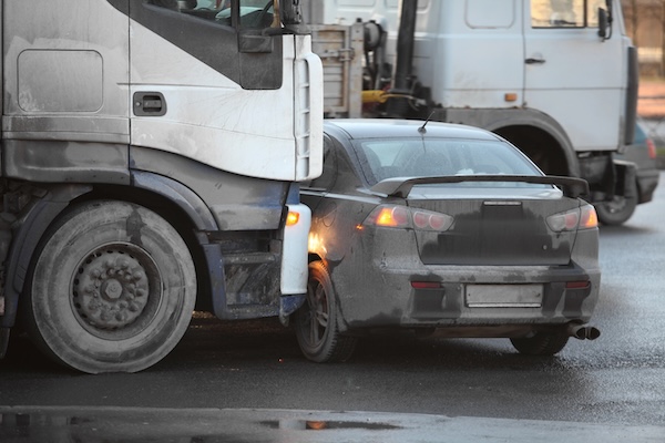 Commercial Truck Crashing Into Car